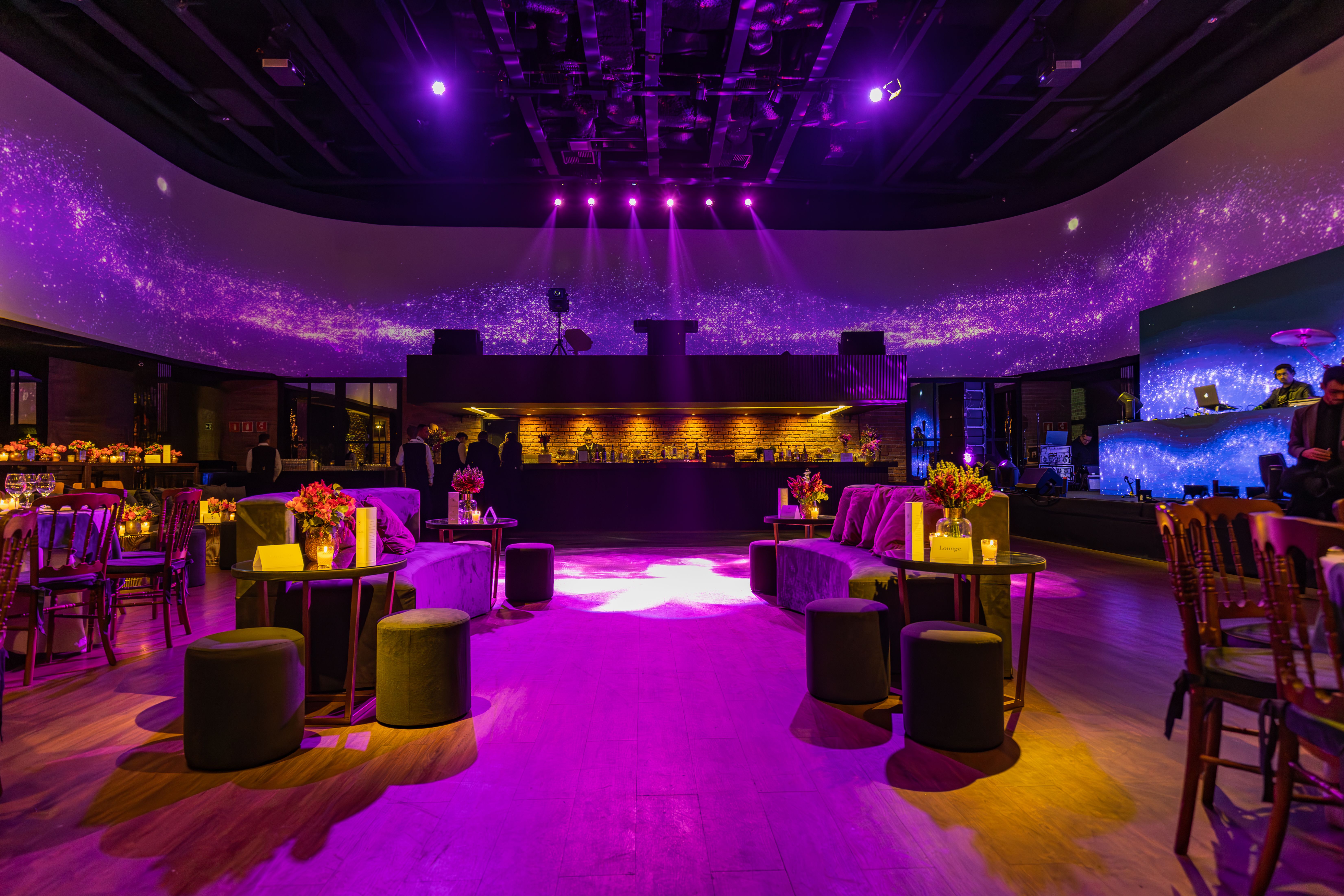 A refined and minimalist luxury club interior with sophisticated lighting and architectural elegance.