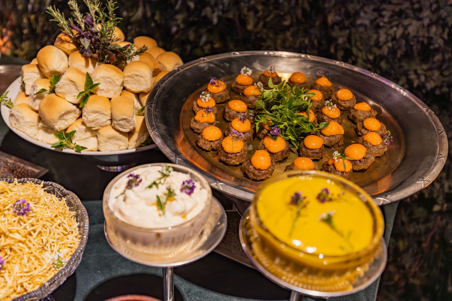 Exquisite banquet setup featuring gourmet snacks and elegant table arrangement.