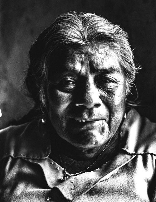 Free Intimate black and white portrait of a senior woman with deep wrinkles and expressive eyes. Stock Photo