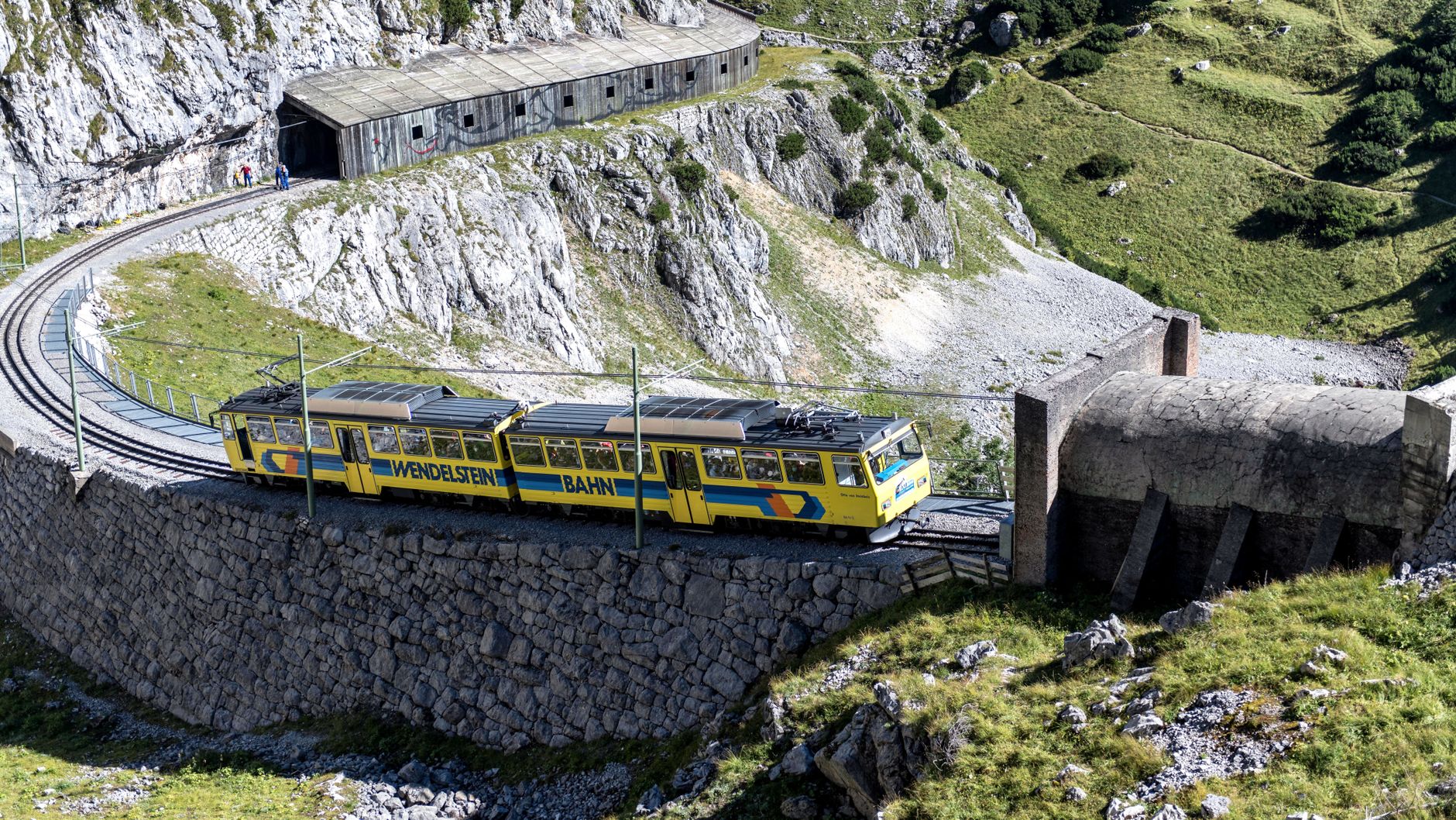 Wendelstein rack railway in Germany on a sunny ridge; scenic train routes europe inspiration
