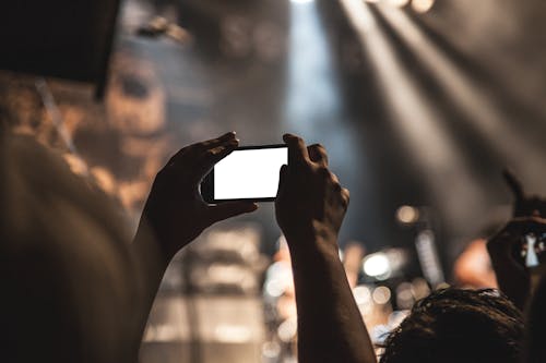 Free Person Holding Black Smartphone Stock Photo