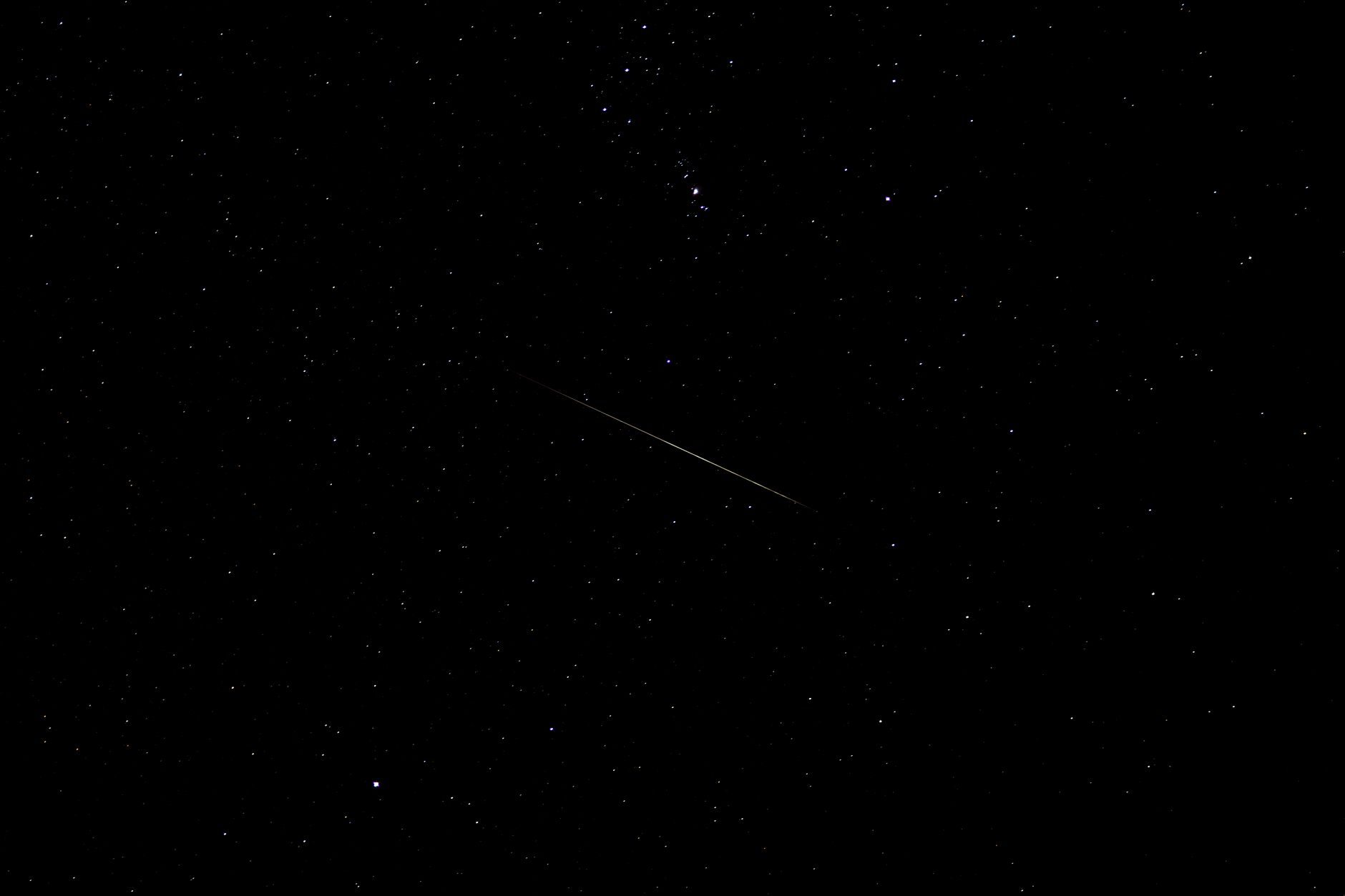 A serene view of a shooting star across a starry sky, perfect for astronomy lovers.