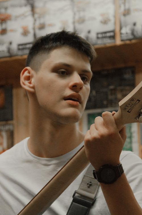 Portrait of Man with Electric Guitar