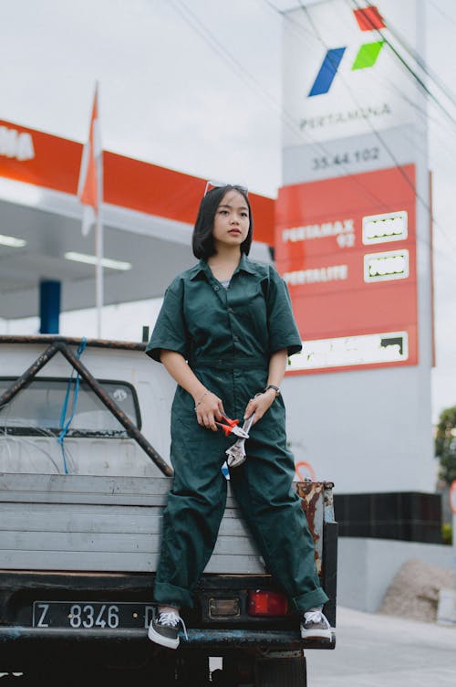 Základová fotografie zdarma na téma asiatka, automechanik, černé vlasy