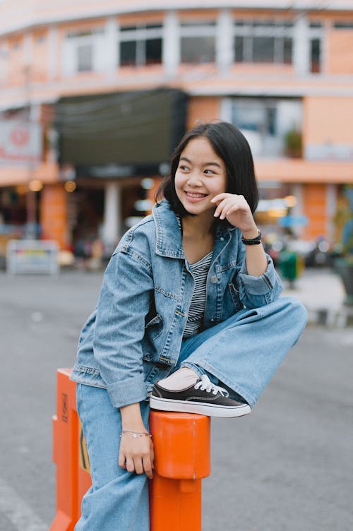 Young Girl in Denim Jacket and Jeans 