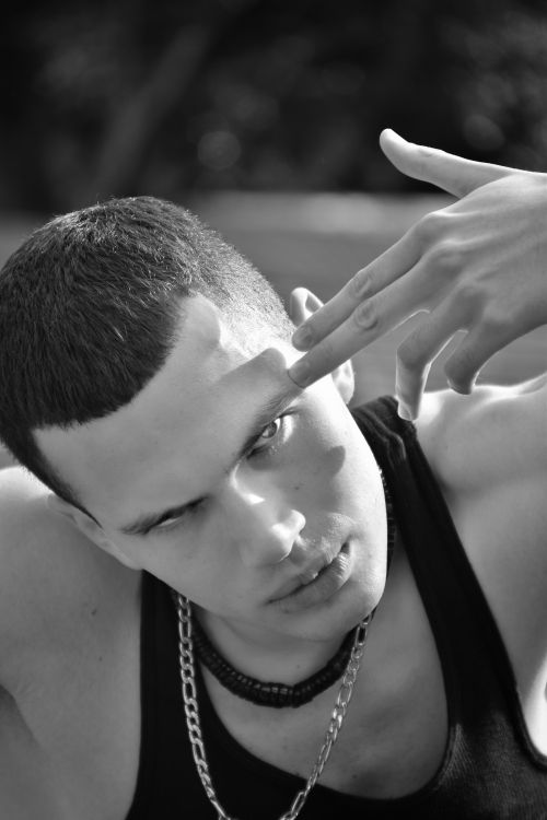 Free Dynamic black and white portrait of a young man with gesture, captured in Ciudad de México. Stock Photo