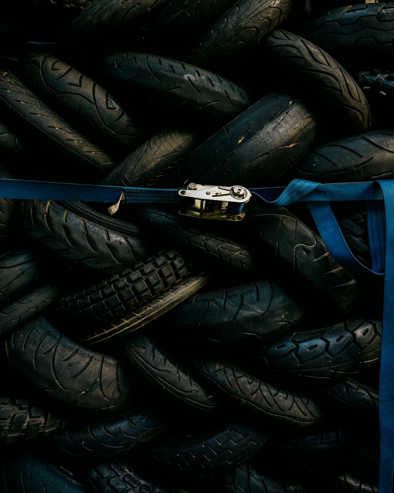 Stack of used tires in a shop
