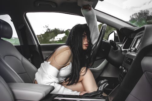 Woman with Black Hair in Car