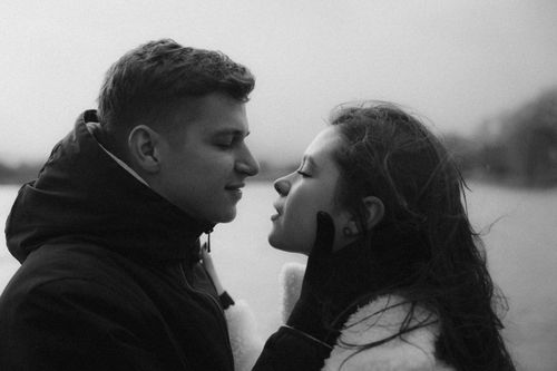 Free A loving couple embracing warmly outdoors in Wernigerode, Germany. Stock Photo