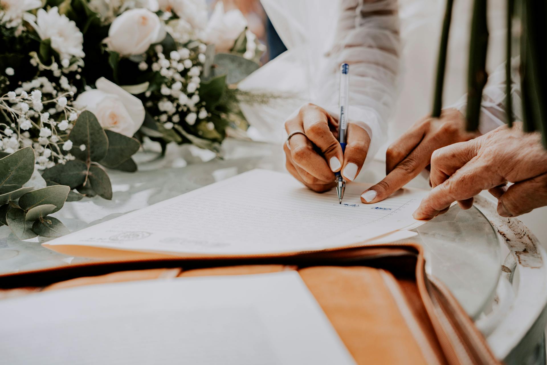 Woman Hands Writing on Document