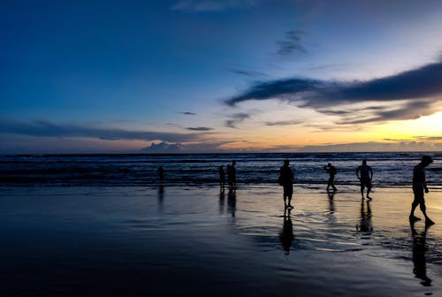 Kostnadsfri bild av i silhouette, kväll-sky, längsta stranden