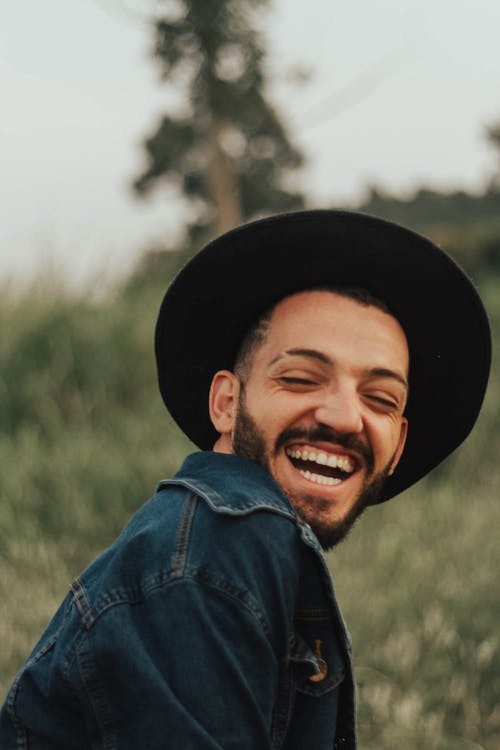 Portrait of Man Wearing Hat Laughing 