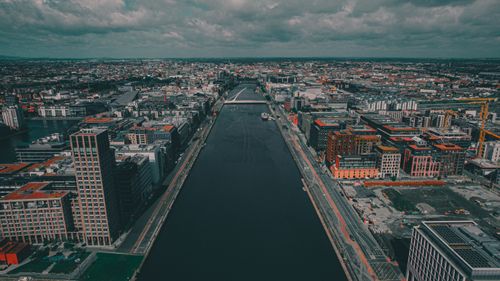 Free Discover the stunning aerial view of Dublin's vibrant cityscape along the River Liffey. Stock Photo