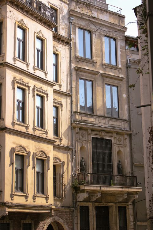 Free Charming European building facades with intricate architecture under sunlight, capturing urban elegance. Stock Photo