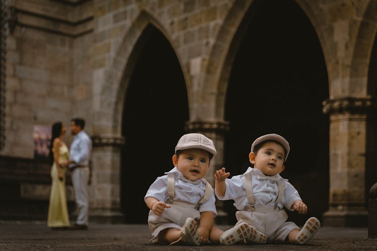 Babies In Shirts And Caps