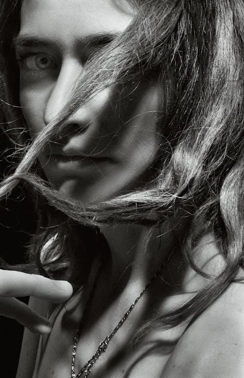 Black and White Studio Shot of a Young Woman 