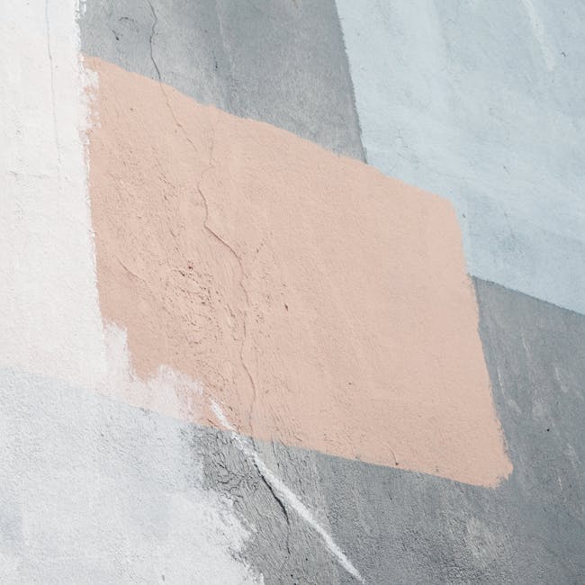 Close-up of a pastel-painted concrete wall in Kadıköy, İstanbul showcasing an artistic texture.