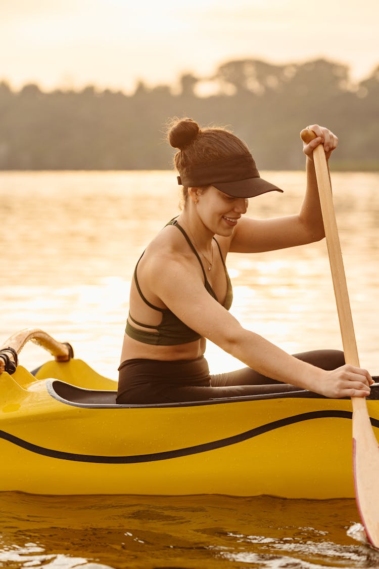 Smiling Woman In A Kayak