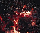 动态特写的红色火焰与火花，展现出强烈的热量与能量