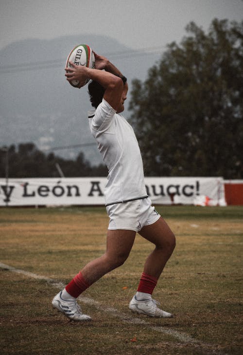 Man Playing Rugby