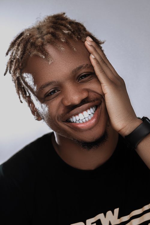 Portrait of a Smiling Young Man · Free Stock Photo