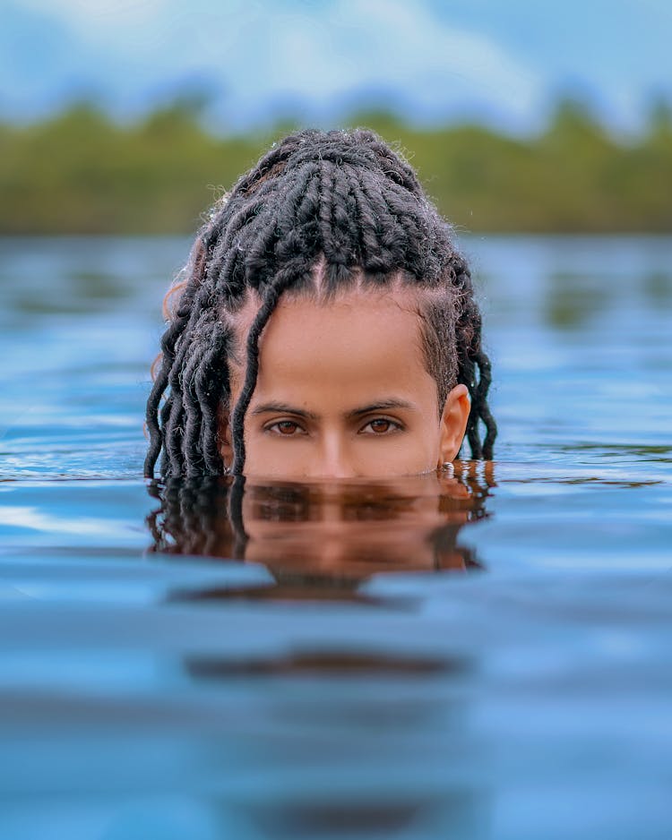 Face Of A Woman In Water 