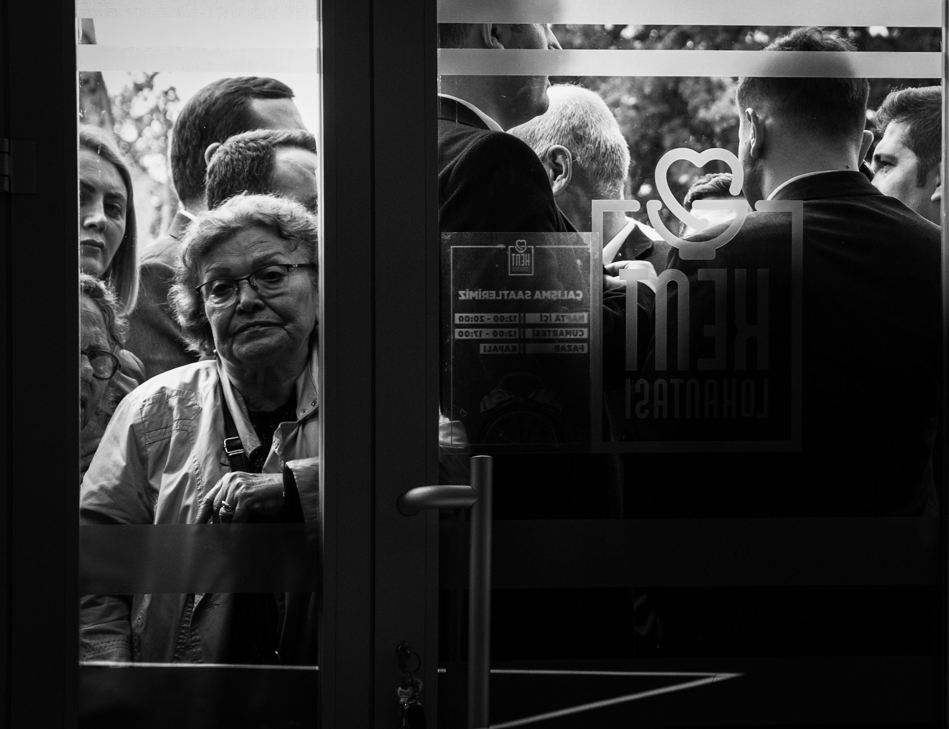 Sign Behind Window People Standing behind Windows · Free Stock Photo