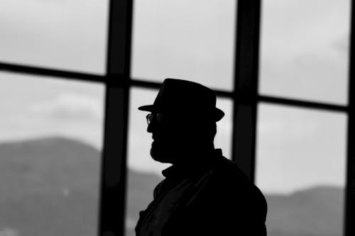 Silhouette of Man in Hat