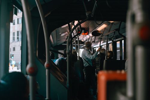 Free Inside view of a Genoa city bus during a bustling commute, capturing everyday life in Italy. Stock Photo