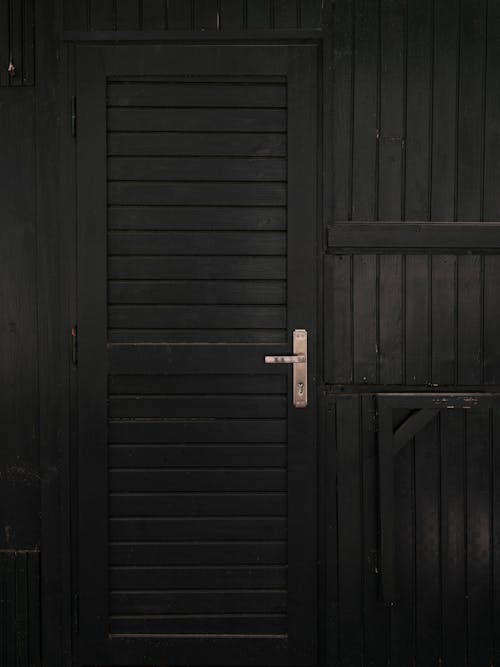 Foto profissional grátis de de madeira, maçaneta, porta de entrada