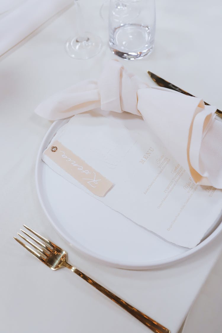 Cutlery And Plate On Table In Restaurant