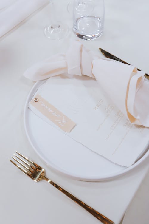 Free Cutlery and Plate on Table in Restaurant Stock Photo