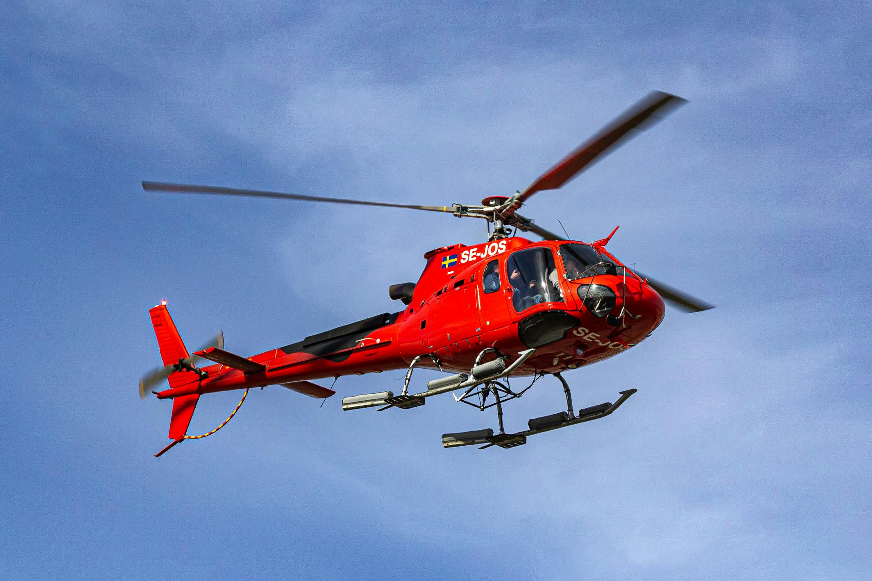 Red Helicopter in Flight · Free Stock Photo