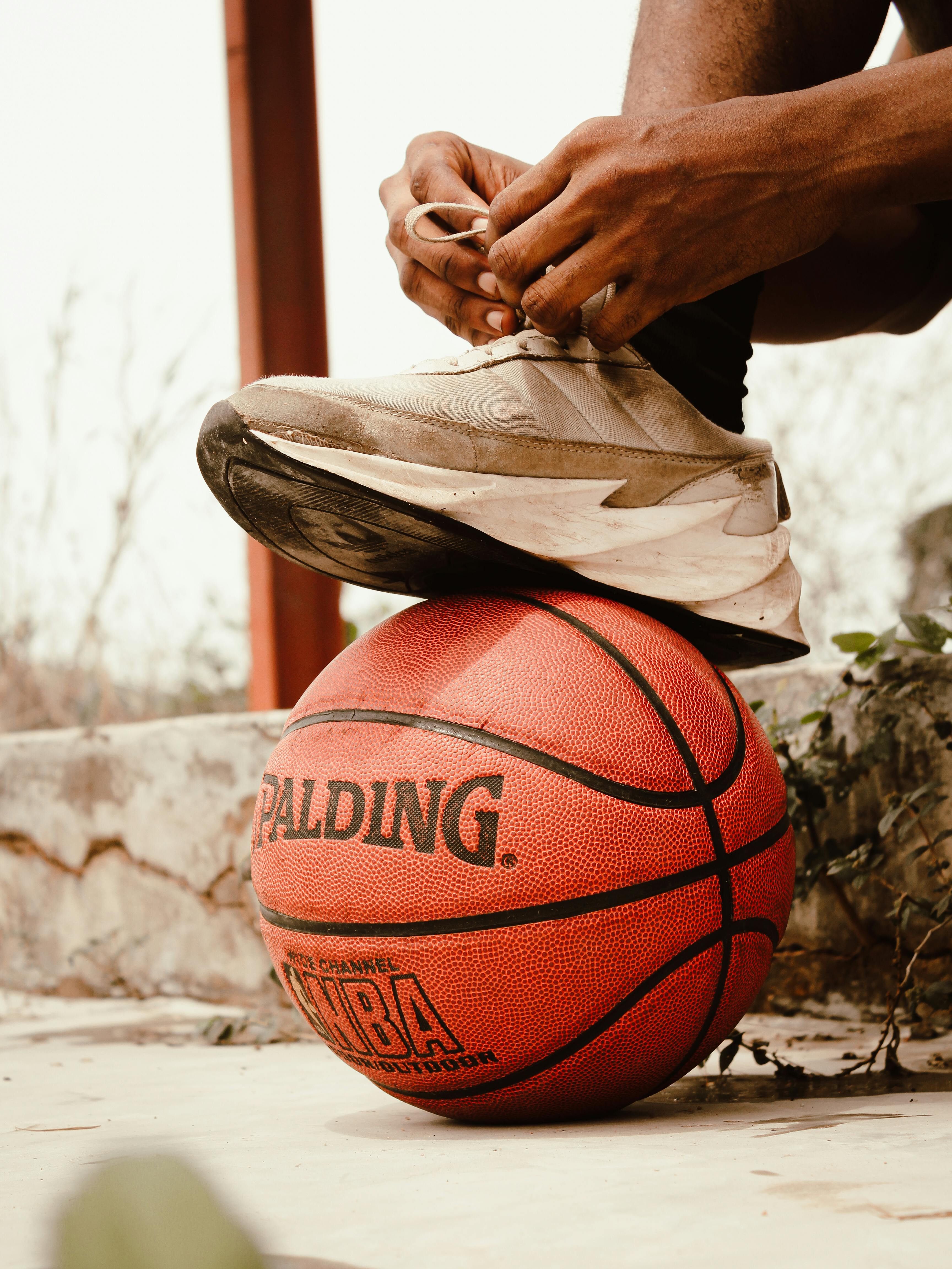 Tying basketball outlet shoes