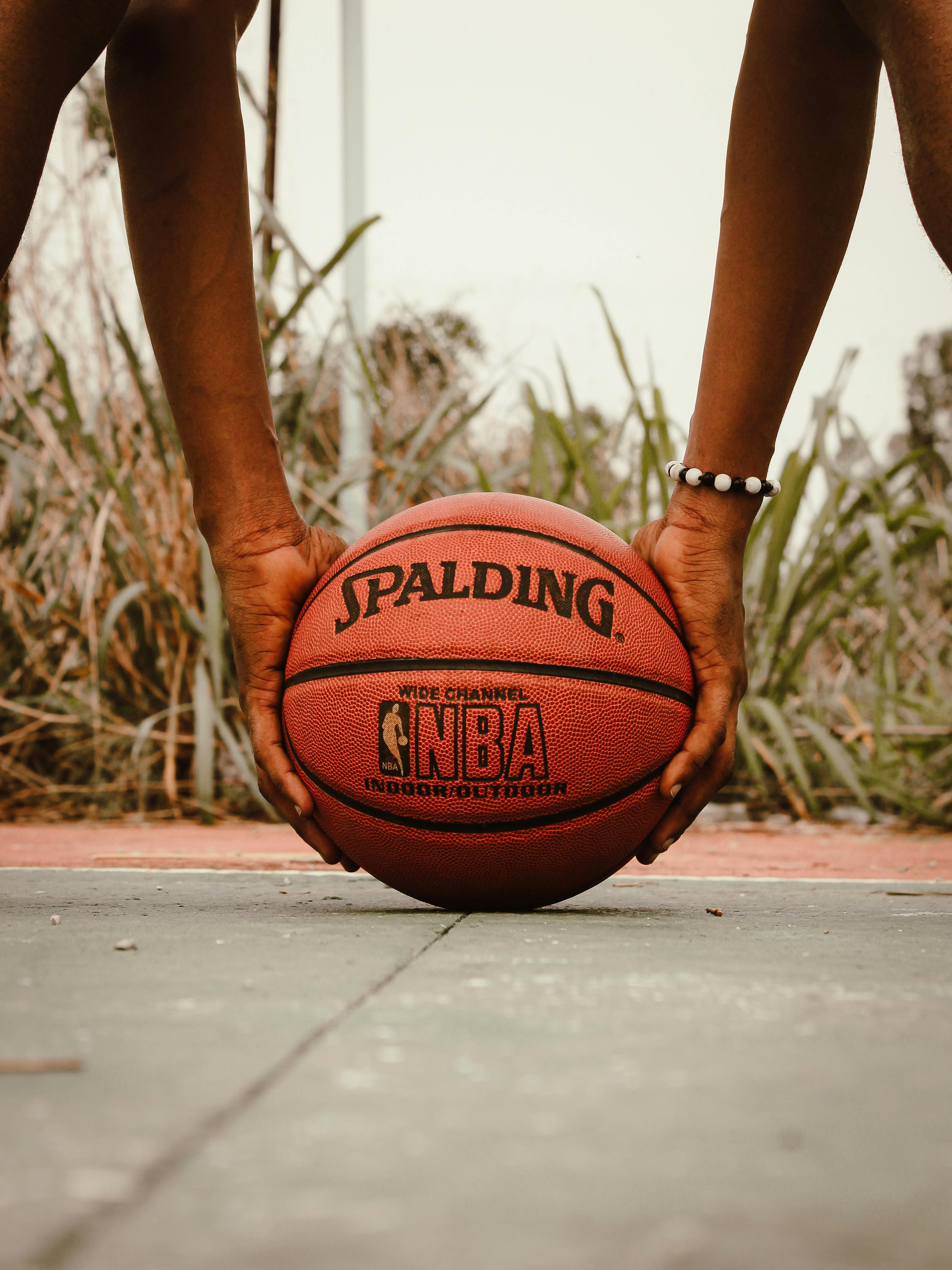 man playing basketball