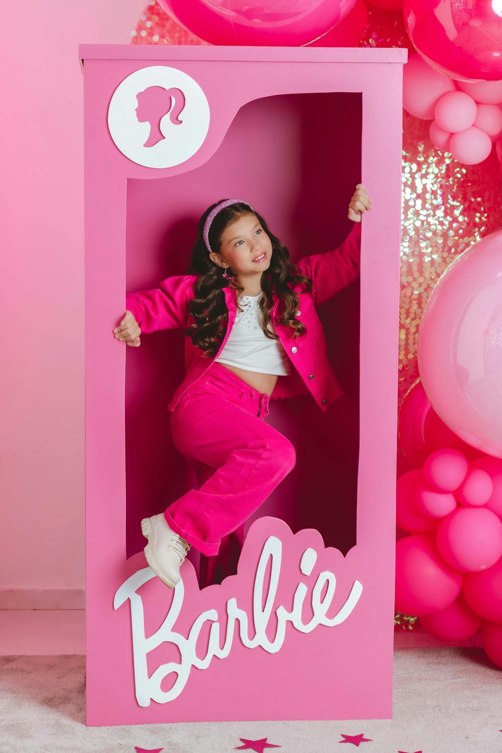 life-sized barbie tox box with girl stepping out of it at barbie theme backyard party life-sized barbie tox box with girl stepping out of it at barbie theme backyard party
