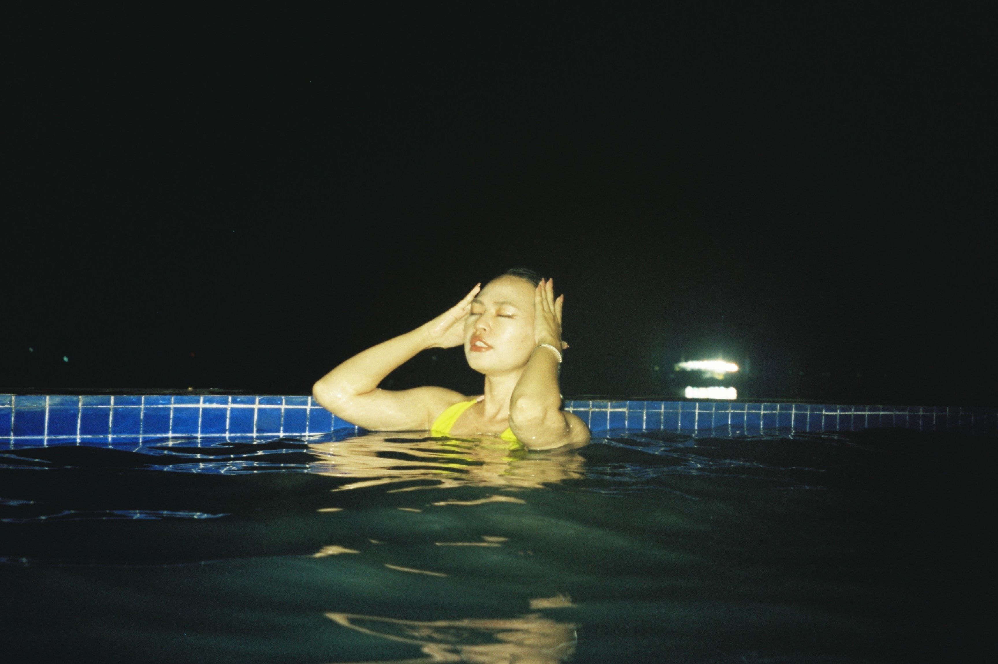 Warm bathing pool at a Gangnam urban jjimjilbang at night