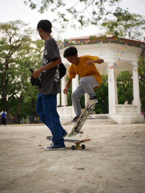 Foto stok gratis trik skateboard