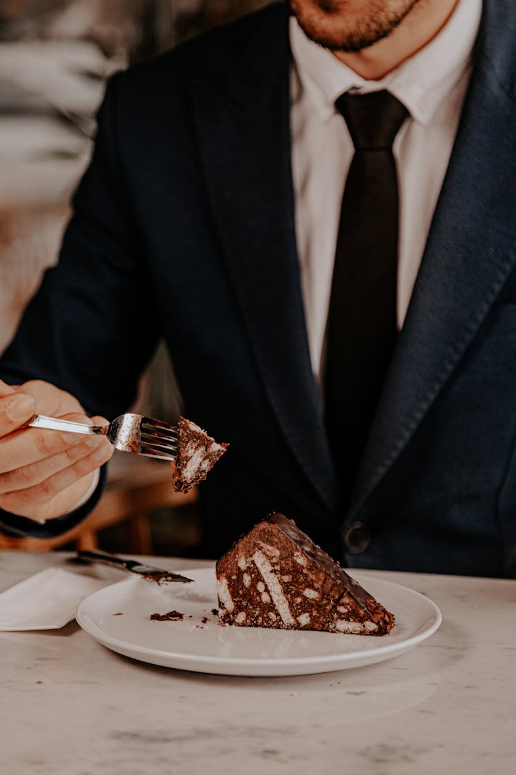 Mam Eating A Chocolate Cake