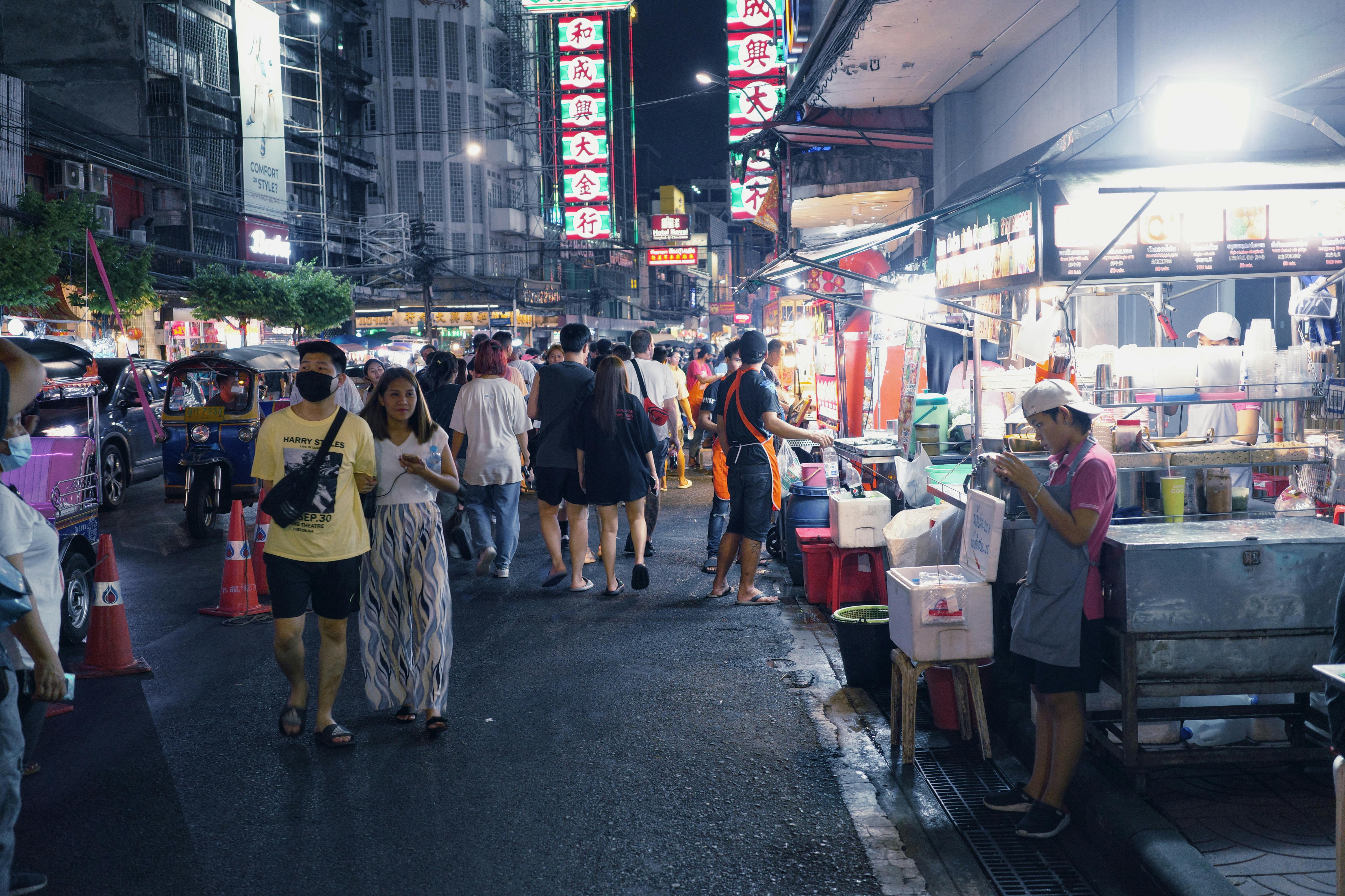 busy night market with food stalls and crowds - Best culinary experiences