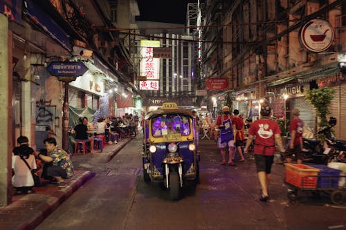 Auto Rickshaw Taxi on Street in Town