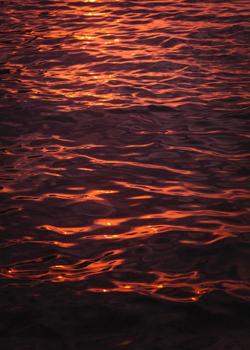 Free Beautiful sunset reflection on rippling water in Antalya, Türkiye. Stock Photo