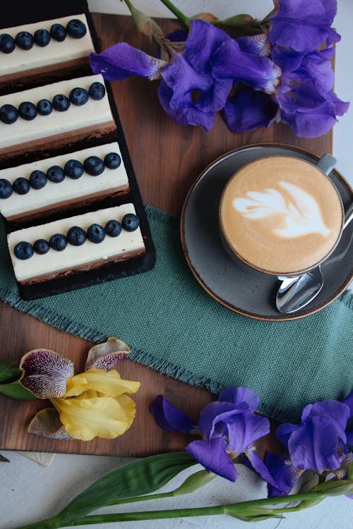 Coffee with Pastries among Irises