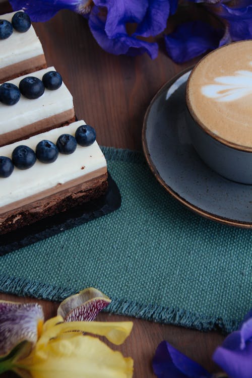 Cup of Coffee and a Cake with Blueberries 