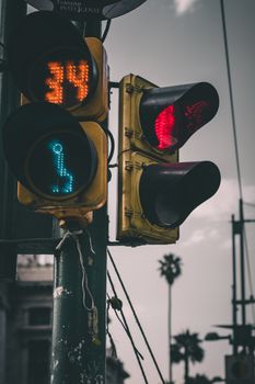 Close-up of traffic lights with countdown timer in Ciudad de México, showcasing urban street scene.