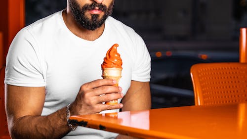 Man Sitting with Ice Cream