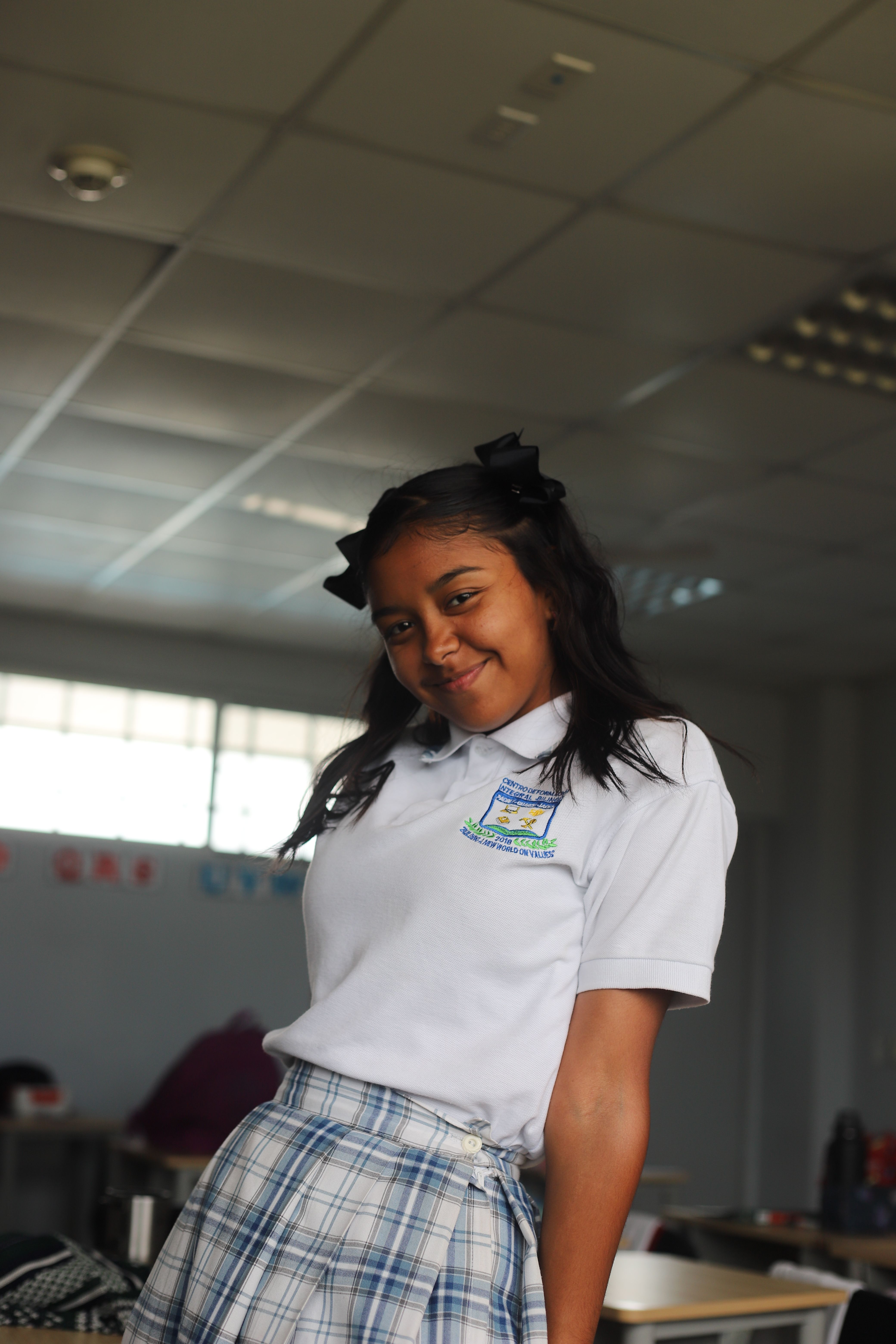 Girl Posing in Classroom · Free Stock Photo