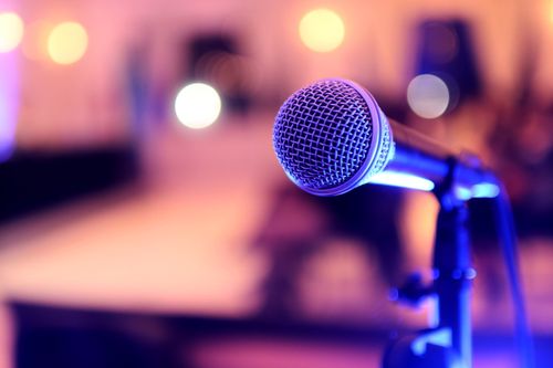 Close-up of a microphone on stage