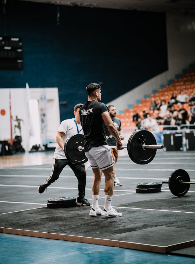 Weight Lifting Competition At Gym