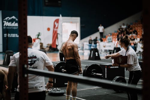 Man Taking Part in a Weightlifting Competition